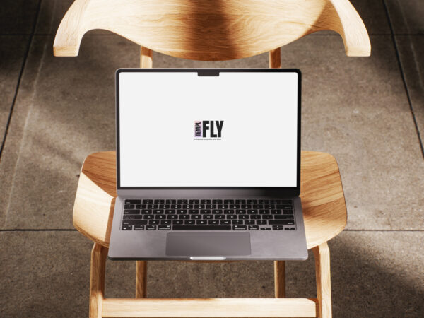 MacBook On Chair Front - Photoshop Mockup