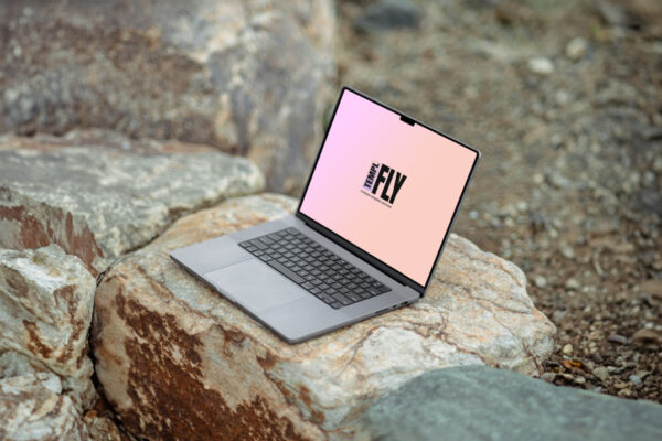 MacBook Pro on Rock - Photoshop Mockup